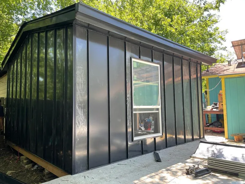 Black standing seam metal wall panels for Roof Inspection in Sugar Grove