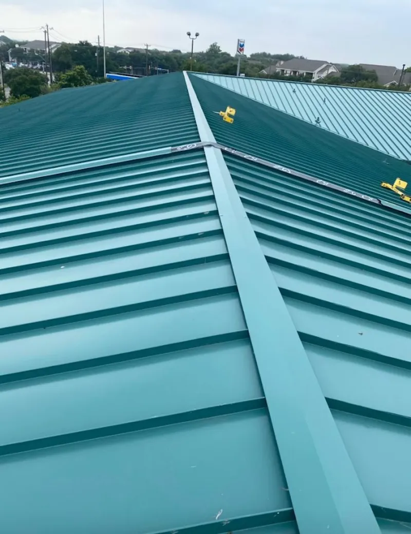 Green commercial metal roof ridge and valley for Metal Roof Repair in Sugar Grove