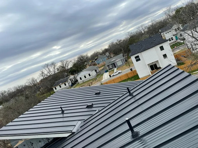Standing seam metal roof panels with vents for Skylight Repair in Sugar Grove